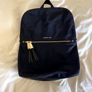 MICHAEL KORS BLUE GOLD AND BLACK BACKPACK